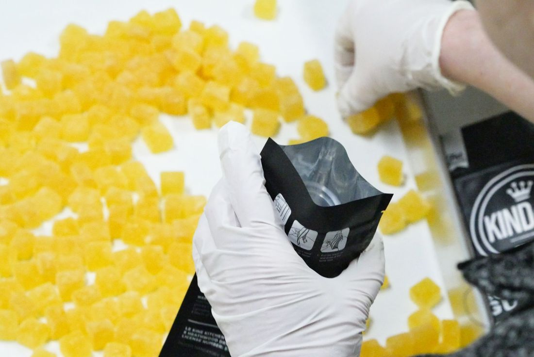 Gummies being packed into Kind & Co bags